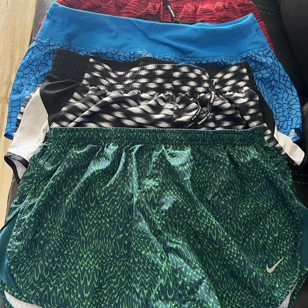 (4) pair Nike Dri fit running shorts w/built in panty. Size L. SOLD